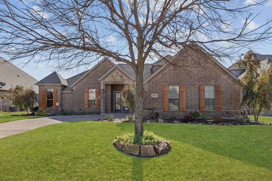 Located in the 24-7 gated and guarded community The Resort, the only golf course and lake community on Eagle Mtn. Lake! This beautifully updated home offers an unmatched blend of luxury, privacy, and lifestyle. Perfectly positioned on the golf course, this home delivers stunning views and resort style living at its finest. The thoughtfully designed floor plan features four bedrooms on the main level, while the upstairs retreat offers endless possibilities, ideal as a fifth bedroom, game room, media room, or private in-law suite, complete with a full bathroom and closet for ultimate privacy.
Designed for entertaining, the open concept living, kitchen, and dining areas create a seamless flow. The chef’s kitchen showcases crisp white cabinetry, quartz countertops, a gas range, abundant storage, and beautifully updated lighting. Gorgeous hardwood floors extend into the expansive primary suite, which overlooks the golf course and features a stunning, updated spa like bath and private patio access—the perfect place to unwind.
Three additional bedrooms on the first floor are thoughtfully situated on the opposite wing of the home and share a full bathroom, offering comfort and functionality for family or guests. Residents enjoy endless amenities, including a 19-hole golf course, clubhouse with restaurant and bar, two pools, fitness center, pickleball and basketball courts, community boat slips and boat ramp, and a private beach area with pergolas.
Conveniently located just 30 minutes from Downtown Fort Worth and DFW Airport, this home offers the perfect balance of tranquility and accessibility.
Please ask for the full list of upgrades, there are too many to list!