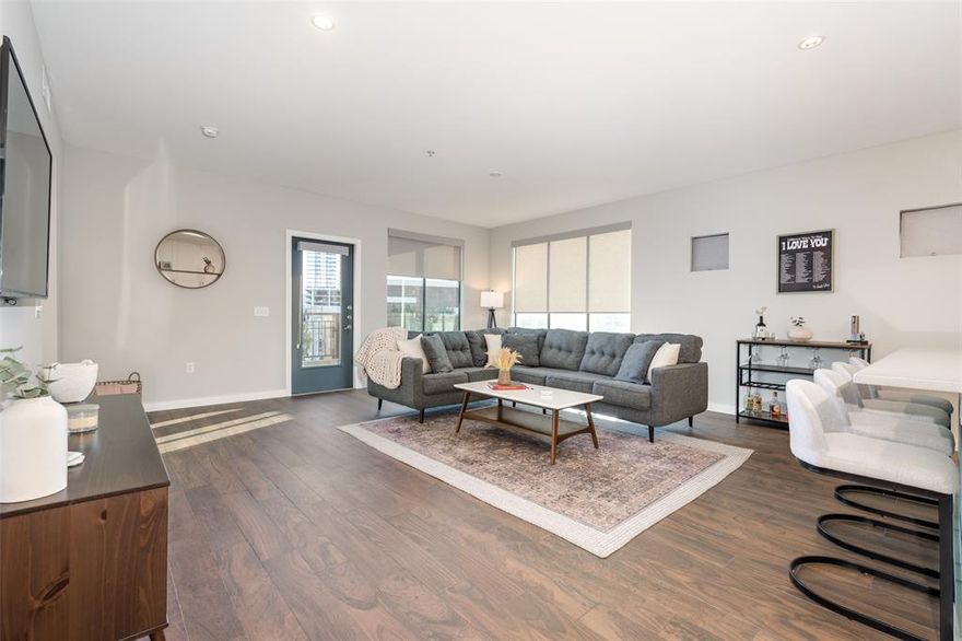 Fabulous corner unit in such an Amazing location! This 2 bed 2 bath corner unit shares no walls with other units. The natural light enhances this flexible open floor plan which offers remote blinds in living room , custom plantation shutters in bedrooms, and fresh interior paint. Generous sized kitchen island perfect for gathering with an abundance of cabinet space that will not disappoint. Incredible primary bedroom ensuite has a walk-in closet PLUS a secondary closet! Walk in closet for spacious secondary bedroom as well. Step outside and enjoy your own private balcony or head over to the inviting outdoor terrace with firepit, grills, and tables for dining. This unit has 2 assigned parking spaces. Additional amenities offered are dog park, stylish lounge, plus work out center. Proximity to Shops, Restaurants, Downtown Dallas, and SMU, is Superb! HVAC replaced 2023.