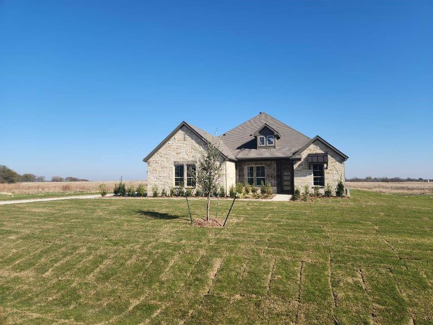 Estimated December 2025 completion! Ask us about our Trade In Trade Up program, we can buy your home! Introducing the brand new Bluebonnet Floorplan! This home offers over 2600 square feet with 4 bedrooms, 3 full bathrooms, study, formal dining, and plenty of space for the entire family! Enter through the covered front porch into the inviting foyer of the home. You will immediately see the private home office with french doors. The open living and kitchen areas are inviting and a perfect space for the family to gather. The expansive kitchen island overlooks the living room with stately corner fireplace. French doors will lead you out to the massive covered patio with an outdoor fireplace included! Private owner's suite is nestled in the back of the home and offers dual vanities, garden tub and separate shower. Don't miss out on your chance to live in the beautiful Rocky Top community!

This home will be zoned for Dixie Hansel Elementary which is currently under construction.