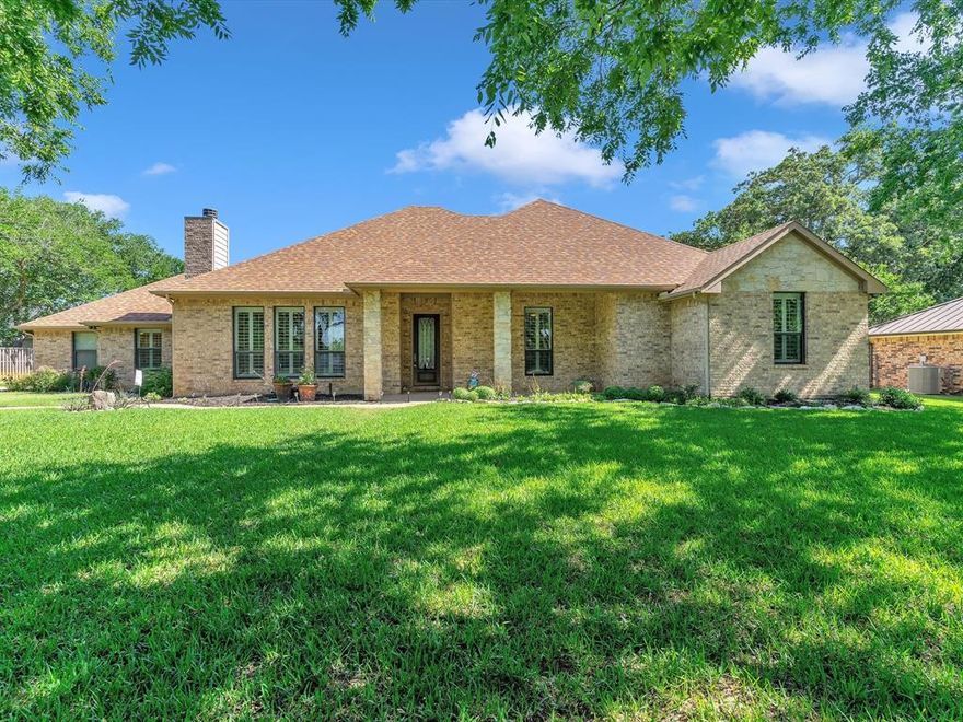 *** Owner Financing Available...20% Down, 7% Interest with a 1 Year Balloon***Hill Country Inspired Home in Gated Lakefront Community of Hickory Estates! Spacious Open Floorplan Greeted w Wood Flooring Throughout, Loads of Natural Light, Austin Stone Accents & Plantation Shutters. Stunning Kitchen is the Heart of the Home w Ample Exotic Granite Countertops & Cabinet Space, Island w Electric Cooktop, Double Ovens, Walkin Pantry & Large Breakfast Bar Open to Dining Area & Living Room...Perfect for All Those Gatherings. Serene Owners Suite w Ensuite Bath...Granite Countertops w Dual Sinks, Jetted Tub, Walkin Shower and His & Her Walkin Closets...Private Exterior Door to Covered Back Porch w Ceiling Fans...Envision Enjoying Morning Coffee w Sounds of Nature. 2 Generous Size Secondary Bedrooms & Full Bath w Granite Countertop & Dual Sinks.  Stellar Community w Views of Lake Lewisville & The Most Beautiful Sunsets in Denton County! This Isnt Just a House...Its A HOME!!!