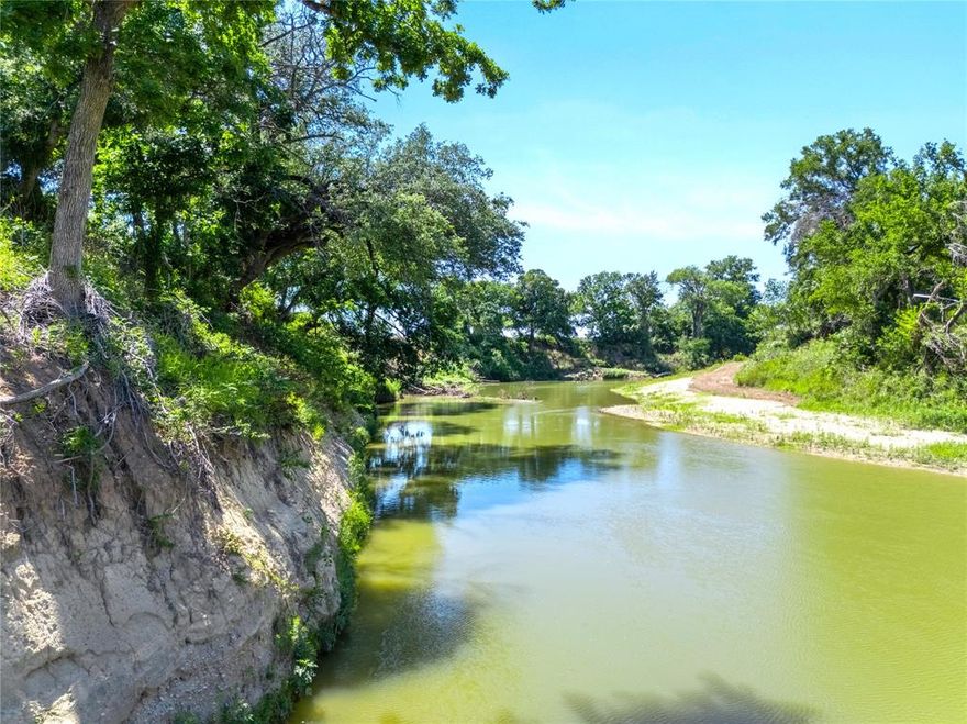 North Bosque Riverfront – Stunning 32+ riverfront acreage just outside Valley Mills with over 900 feet of North Bosque River frontage and more than 900 feet of Highway 6 road frontage.  Unwind on this this versatile property that features mature pecan groves, fenced pastures and is under ag exemption—ideal for grazing, recreation, or a potential homesite. Enjoy convenient access off Highway 6 through a private electric gated entrance with keypad. Close to Waco and Clifton and 1.5 hours from Dallas. Located in Valley Mills ISD with water and electricity available It's perfect weekend retreat and recreational property with beautiful scenery, animals and fishing. Water & Electricity Available. Additional 22 acres available.