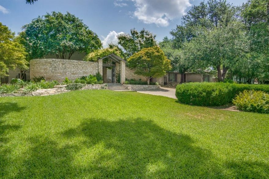 Enjoy Luxury and privacy in this beautiful Colonial Hills home loaded with classic elegance & modern amenities situated on a spectacular .65 acre park-like lot with an oversized pool located in the heart of Fort Worth's Historic Colonial Hills Area within walking distance to TCU & Colonial Country Club. Updated throughout with 3 spacious bedrooms on the 2nd floor & a 4th bedroom with ensuite bath on the lower level with an adjacent sitting room. The gourmet custom Kitchen is a chefs dream featuring stunning quartzite countertops, a large center island, and professional grade stainless steel appliances including a commercial-style gas cooktop and refrigerator. Beautiful formals with hardwood floors, fireplace and built-in shelves surrounding the dining room.  The family room has a beamed ceiling and a wall of windows overlooking the expansive backyard. Loads of extra parking in the rear. Just Minutes from Downtown Ft Worth, The Cultural & Medical Districts & The Shops at Clearfork!