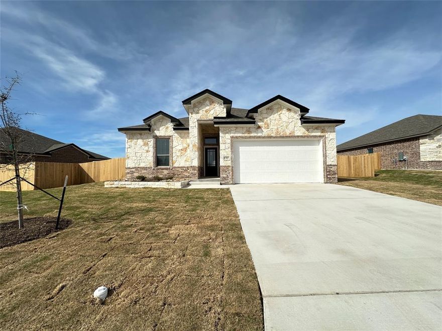 Built by Carothers Executive Homes, a five-generation family-owned builder renowned for quality and craftsmanship, this Bartlett plan offers 3 bedrooms and 2 bathrooms in Rosenthal Estates, within Lorena ISD. The open-concept design features a chef’s kitchen with quartz countertops, soft-close cabinetry, GE Profile appliances, and a No Preheat Airfry Oven. The primary suite includes a vaulted ceiling, spacious walk-in closet, and spa-inspired bath with a zero-threshold shower. Additional upgrades include custom soft-close cabinetry, wood-look ceramic tile, crown molding, ceiling fans, and energy-efficient spray foam insulation.