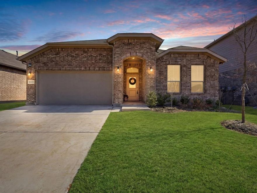 Location, location, location! Directly across the street from the neighborhood playground, pool, and scenic walking trails, this home offers unmatched convenience in the highly sought-after Trails of Elizabeth Creek within Northwest ISD. Just over a year old and gently lived in, this home offers the feel of new construction without the wait. The same floorplan costs over $400,000 to build new today — making this an outstanding opportunity in a prime location. Designed with an open-concept layout ideal for everyday living and entertaining, the spacious kitchen serves as the heart of the home. It features quartz countertops, stainless steel appliances, a gas range, a large island with breakfast bar, and abundant cabinet and pantry space. A dedicated work nook provides the perfect space for working from home, homework, or daily organization. The private primary suite includes dual sinks, an oversized shower, linen storage, and a generous walk-in closet. Secondary bedrooms are well-sized and thoughtfully positioned for privacy. Enjoy a fully fenced backyard perfect for relaxing or hosting guests. Situated on a quiet interior street while still being just steps from community amenities and close to schools, this home offers both convenience and comfort. Additional highlights include smart home technology, a tankless gas water heater, sprinkler system, and energy-efficient HVAC. Ideally located near the Alliance Corridor with easy access to I-35W and Hwy 114, plus shopping and dining just minutes away. Community amenities include a resort-style pool, cabana, playground, and lazy river. Seller is motivated and ready to work with serious buyers — don’t miss your opportunity to own a nearly new home in this great neighborhood.