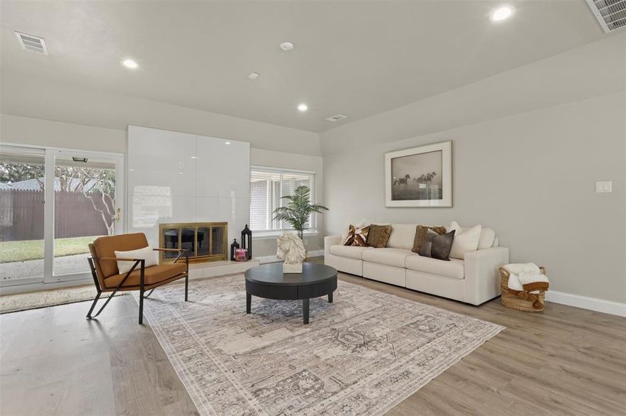 Welcome to the new standard of Dallas living at 6350 Glennox Lane. This perfectly positioned four bedroom three bathroom residence in the heart of Lovers Lane East is a masterclass in sophisticated design and functional luxury. Spanning 2,654 square feet, the home has been meticulously reimagined with an artistic flair that blends traditional architecture with high-end modern finishes.

The light-filled open floor plan features a spacious living area centered around a sleek masonry gas fireplace with a raised hearth. The chef's dream kitchen serves as the heart of the home, showcasing white shaker cabinets, double ovens, high-end stainless steel appliances, and soft-close drawers. A painted eat-at island topped with quartzite countertops provides both style and utility for effortless hosting.

Retreat to the primary suite featuring an updated ensuite bath with a free-standing tub, separate shower, and dual sinks. A private guest suite with an ensuite bath and two additional large bedrooms provide versatile living options for families or professionals. Modern essentials include smart home technology, a tankless water heater, and a whole-home backup generator.

Outdoor living is elevated with a large covered back patio and a dedicated dog run. Situated on a prime corner lot with a rear-facing two-car garage, this property offers exceptional curb appeal with its painted brick exterior and lattice-design windows. Residents enjoy easy access to White Rock Lake, the scenic White Rock Trail, North Park Mall, and top-rated Dallas ISD schools.