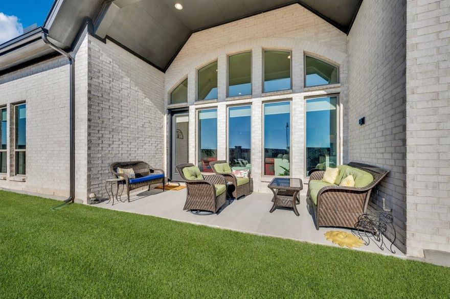 Considering New Construction? Compare the timeline, out-of-pocket costs, and final price--you may find this home delivers more value, sooner! 2025 Perry Home featuring 4 bedrooms, 4 baths, and a 3-car garage with an epoxied floor loaded with numerous upgrades. The moment you step inside, this thoughtfully designed home welcomes you with neutral designer finishes, high ceilings, expansive rooms, and a grand entry way. A spacious home office with French doors and large windows offers the perfect work-from-home space. A formal dining room area leads to the heart of the home through the butler's pantry to a large island kitchen featuring a walk-in pantry, upgraded backsplash, storage drawers, double oven, Cafe Gas Stove and a breakfast bar to seat 7! Open concept with a very large spacious family room, large morning area and game room with french doors all just past the kitchen. Master suite includes primary bath with dual vanity, rain glass window over freestanding tub, separate walk in shower, two walk-in closets, a linen cabinet and a private water closet. Guest suite offers private bath, walk in shower and huge walk in closet offering multi generational  living in this Perry built home with unique floor plan! The living area showcases a true showstopper fireplace with a marble surround and dark oak mantle, blending modern elegance with timeless appeal. Light wood-look tile flows seamlessly throughout the home, no carpet and complemented by custom roller shades on every window. All four bedrooms feature walk-in closets and ceiling fans for added comfort. Office has ceiling fan, recessed wall for cabinetry, Chandelier in Entry and dual drum shade fixtures in Dining Room. See the features sheet for full details. A perfect blend of quality construction, modern design, and everyday livability. Buyer Incentives Available! Seller is offering 1st year HOA dues paid in full, rate buy-down with preferred lender. Flexible sellers willing to work with buyer’s needs!