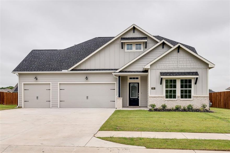 Welcome to this exquisite Craftsman-style home that combines timeless elegance with modern amenities. Step inside and be greeted by a spacious living area adorned with a cozy gas fireplace and decorative lighting, creating the perfect ambiance for relaxation and entertainment. The kitchen boasts stunning granite countertops, an expansive island, and energy-efficient appliances, making it a chef's dream. Retreat to the primary suite, complete with a luxurious ensuite bath featuring dual sinks, a garden tub, a linen closet, and a separate shower. Upstairs, you'll find a charming nook ideal for a study or reading area. This home also offers a convenient 3-car garage and an extended covered rear patio, providing ample space for outdoor enjoyment. The community is located in close proximity of Tioga ISDs highly rated Elementary & Intermediate schools. Don't miss the opportunity to make this your dream home. Schedule a showing today!