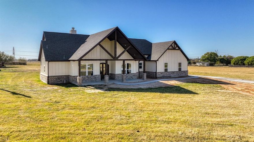 This 5-acre ranchette is perfect for those looking to embrace country living. Inside, includes 4 bed 2 full bathrooms, along with a convenient half bath and a dedicated office on 5 acres. — your private oasis with NO Known Restrictions, NO City Taxes & NO HOA! The heart of the home is a chef’s dream: an oversized kitchen featuring expansive granite countertops, a large walk-in pantry, and plenty of space for culinary creations. The open-concept living area features a floor to ceiling stone fireplace & bathed in natural light, with big windows that bring the beauty of the outdoors inside, creating a bright and airy atmosphere perfect for relaxing or entertaining.  When it’s time to unwind, retreat to your owner’s suite, a peaceful sanctuary with a spa-like bathroom. Indulge in the modern walk-in shower or enjoy a soothing soak in the separate soaking tub. The split-bedroom layout includes two bedrooms sharing a Jack-and-Jill bath, along with a 4th bedroom that could be used as flexible space that can serve as an exercise room, guest lounge, or additional office. Step outside onto the expansive back porch, complete with access to the half bath — ideal for outdoor entertaining or quiet evenings under the stars. Animal enthusiasts will love the freedom to bring horses, cattle, chickens, and more. This move-in-ready home combines modern comfort with privacy and freedom, making it the perfect place to call your own. Don’t miss this exceptional opportunity! Txt keyword ZEAL22 to 88000 for Virtual Tour & more!