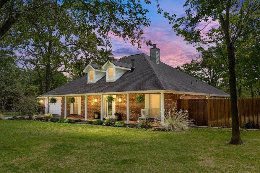 Nestled in a park-like setting on three lots, it will welcome you Home Sweet Home.  The property includes the house, a shop equipped with a 10-ton auto lift, TONS of storage and a guest quarters with a bath. The main shop measures 30x40 and a 12x30 air-conditioned guest quarters, perfect for family, friends, or a VRBO. This amazing property features numerous updates, including spray foam insulation, solar panels (owned) and a generator. For detailed information, please see the attached document. The meticulously maintained gardens are filled with perennials, a peach & pear orchard, a greenhouse and a planting building. With a private water well, you can enjoy this beautiful landscape without high water costs. Lake access is available through the POA boat ramp, just a few lots away. The updated and exquisitely maintained home features an open kitchen, living area, casual and formal dining spaces, a wood-burning stove, and split bedrooms. Stainless steel appliances, granite countertops and abundant storage EVERYWHERE.  The annual plants and landscape are truly stunning. The property features a completely fenced-in yard, offering space to grow on the extra lot, plus extra covered storage for all your outdoor equipment & water toys.  Just 1 hour from downtown Dallas and 3 hours from Houston!