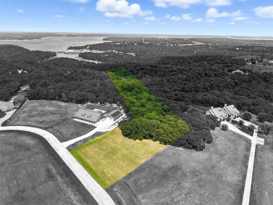 Presenting a tranquil 4.216 acre tract in the highly coveted Texoma Bluffs subdivision on Lake Texoma. Backing to Corp of Engineer property, this lot provides an escape for people looking to build a custom home in a private, gated lake community with minimal homes. With utilities available at the road, and minimal dirt work required, this lot is truly ready for you to build your dream home. The property is located just 7 minutes from Rock Creek Resort and Golf Club and Megastar Casino, 10 minutes from Cedar Mills Marina, and 18 minutes from downtown Whitesboro. With several other lake marinas and amenities nearby, this lot is in the ideal location for someone looking to build a beautiful home in a community that blends luxury and space.