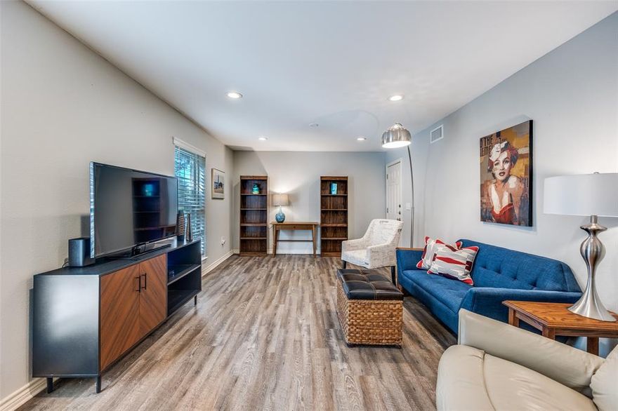 Single-story, first-floor condo that has been remodeled. Corner unit with fewer shared walls and more windows. Natural light comes from multiple directions.

You get an open floorplan with no carpet. Luxury plank flooring runs throughout and includes extra planks for future use. The kitchen features quartz countertops, a subway tile backsplash, and recessed can lighting that continues through the home.

The primary bedroom is oversized. It easily fits a king bed with end tables. Storage stands out with a walk-in closet in the primary bedroom and a second large closet in the hallway. The bathroom offers a walk-in shower and strong storage options.

Assigned gated parking sits immediately outside the front door at Unit 21. The covered front porch is gated as well. Community amenities include a pool.

Mature oak trees surround the property and provide shade. The highest electric bill has been $90. The area is very walkable and close to daily needs.

Check the documents for a full list of items available to purchase with the sale.