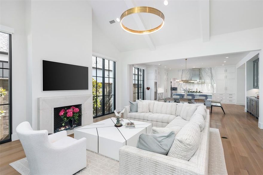 Welcome to this beautifully designed custom home by Mark Molthan nestled in a prestigious gated community of the Bluffs at Cochran Chapel. With a perfect blend of modern elegance, this transitional-style home offers luxurious living at its finest. High ceilings and walls of windows welcome you into the home. As you step inside, you’re greeted by an inviting open floor plan that seamlessly connects three spacious living areas, providing ample room for both relaxation and entertaining. The chef-inspired kitchen is a culinary dream, featuring top-of-the-line appliances, a full-size wine refrigerator, and an expansive working pantry that will delight any gourmet enthusiast. Extend your living room by opening the large sliders to take in the California inspired sunroom. The home office offers a quiet retreat for productivity, while the downstairs primary suite provides an area for relaxation and comfort while reading a book in front of the fireplace. The custom-designed primary closet is a standout feature, providing an exquisite space for your wardrobe with thoughtful organization in mind. Two other bedrooms with ensuite bathrooms are also downstairs for family and friends. Upstairs features a large guest room witj ensuite bath and game room. Step outside to your private oasis, where a pergola-covered patio invites you to unwind. The pool-sized backyard offers endless possibilities for outdoor enjoyment, whether you envision a serene garden, an outdoor kitchen, or a sparkling pool to cool off on hot summer days. This lock and leave home is more than just a place to live; it's a sanctuary where every detail has been meticulously crafted for comfort and style. Don't miss the opportunity to make this exceptional property your own!