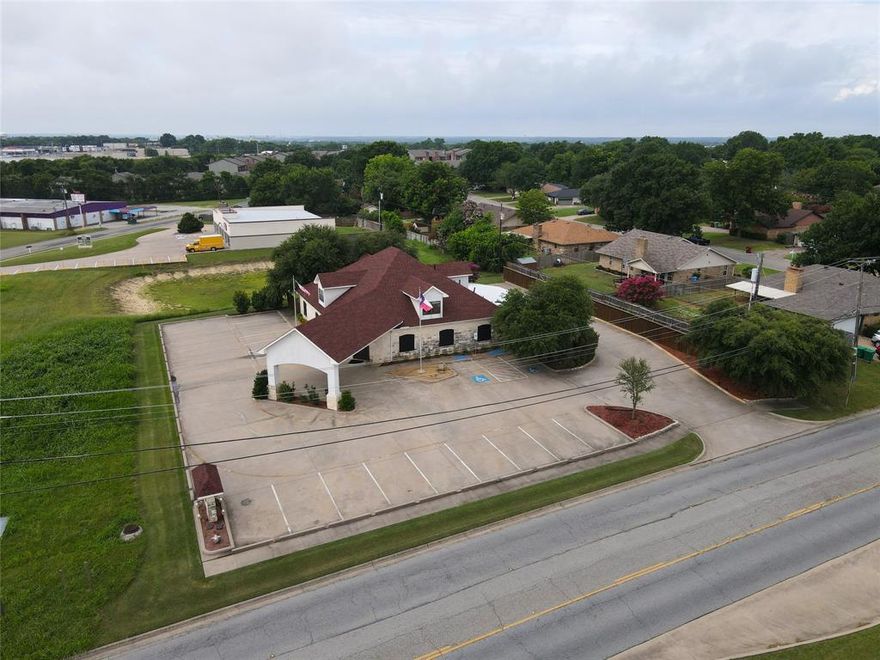 Exceptional opportunity to acquire a purpose built medical office offering turnkey functionality for an investor or owner occupant. Whether you're expanding, relocating, or launching a new practice, this property delivers the ideal combination of accessibility, visibility, and professional efficiency. Centrally located in Sherman, TX, between US Highway 75 and Texoma Parkway, the building benefits from traffic exposure and ease of access, offering convenience for both patients and staff in one of the area’s fastest growing corridors. Ideal for medical, dental, or wellness practices, the first floor features 6 exam rooms, 3 private offices, X-Ray room with leaded walls and appropriate power, dedicated nurses’ station, comfortable lobby and waiting area, separate check-in and check-out stations, while the second floor offers ample storage for supplies or files and a spacious break room area. The building is well equipped with a drive through awning, spray foam insulation, tankless hot water and efficient natural gas systems.