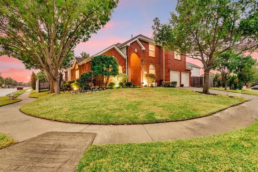 Welcome Home. This gorgeous 4-bedroom, 2.5-bath home with 2 Living areas, Office and Gameroom area is packed with features you will absolutely love. Sitting on a beautiful corner lot with stunning curb appeal, this property checks all the boxes. Step inside and you're greeted by a grand layout with vaulted ceilings, a formal living room, formal dining area, and a private office. The open floor plan and abundant natural light keeps everything flowing and feeling super spacious throughout. The island kitchen is a real showstopper with updated stainless steel appliances, including a double wall oven, dishwasher, and refrigerator, all WiFi ENABLED APPLIANCES you have the option of controlling remotely, to let you start dinner or manage chores before you get home. Plus, you'll have loads of counter space and storage to keep everything organized. The Breakfast Nook provides access to the back covered patio and is open to the Kitchen and Living Room. The Living Room, anchored by a gas fireplace, will easily accommodate all your furniture needs. The first floor Primary Bedroom suite is a true retreat featuring dual sinks, a separate shower, garden tub, and a huge 7 by 10 ft walk in closet. A separate Laundry Room, and convenient Half Bath round out the first floor. Heading upstairs, you'll find three large bedrooms, full bathroom and a fun gameroom loft area. Here's where it gets even better..THIS IS A FULLY UPDATED SMART HOME with smart light switches, dual-zone smart thermostats, smart smoke and CO2 detectors, smart locks, and a doorbell camera. Everything's already set up for you to manage quickly and easily. Outside, the large covered back patio and beautifully landscaped yard with mature trees are ideal for relaxing or entertaining.  You're just a few minutes from Lake Arlington and tranquil community dock and park. Easy highway access for commuting.  Abundant shopping and entertainment areas just minutes away.   Schedule your showing today!  You won't be disappointed.