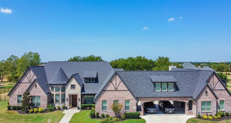 A MUST SEE ONE OF A KIND with U-drive totaling 8 covered parking areas! Garages have epoxy floors, custom lighting, built-ins, and a work bench. Inside you’ll see expansive hardwood floor, architectural ceilings, bdrms with en-suite baths, plantation shutters throughout, lrg media & game room, elegant light fixtures, lrg lvg area, office, and loads of natural light & closets throughout. Master suite with his & hers closets & vanities, spa master bath, walk-in shower. Thoughtful additions are radiant barrier, sound insulation around the media room and tank-less hot water heaters.  Addition completed in 2022, includes a 1 bdrm apartment-in-law suite upstairs with all amenity hookups, a separate large bonus-man cave w full bath & a kitchenette. All surrounded by an expansive back patio & full sprinkler system. Built-in Coyote grill, fireplace, 16x8 pergola, large floating deck, resort style pool w tanning ledge, waterfalls, & bubblers.  Attic w plywood flooring & custom shelving & lights.