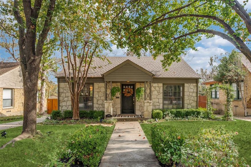 This beautifully renovated Austin Stone Cottage blends timeless style with thoughtful modern updates in one of East Dallas’s most charming neighborhoods. Zoned to Lakewood Elementary, this inviting home features restored original windows, refinished oak floors, and an advanced Lutron lighting system that sets the perfect ambiance throughout.

The bright, updated kitchen shines with freshly painted cabinetry, stone countertops, subway tile backsplash, and new GE Profile WiFi appliances including a refrigerator, range-oven, dishwasher, and microwave. Bathrooms have been completely refreshed with stylish finishes.

The spacious primary suite includes a walk-in closet, en suite bath, and convenient laundry space. Step onto the elevated back deck to enjoy views of the large fenced yard, lush landscaping, and cozy fire pit area, ideal for relaxing or entertaining.

With a detached two-car garage, close proximity to Lindsley Park and Tennison Golf Course, and a perfect mix of character and modern comfort. 7014 Vivian Ave is truly move-in ready perfection!