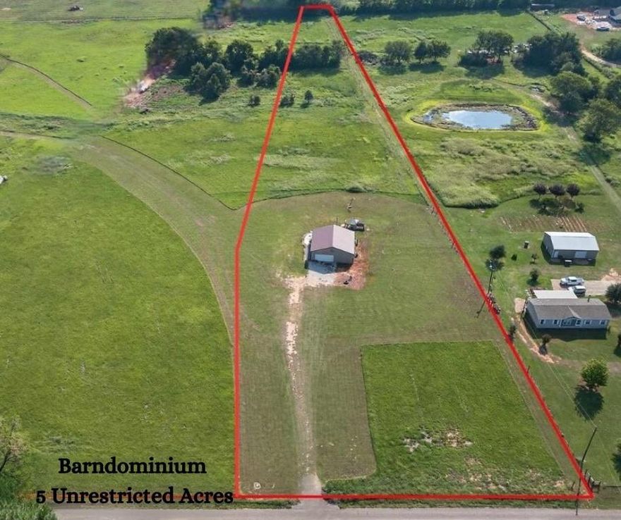 Welcome to country living at its finest! This 2022 Custom Built Barndominium offers 1,600 sqft of modern living space perfectly situated on 5 acres, giving you the freedom to create the lifestyle you have always dreamed of. Step inside to the perfectly designed kitchen with granite countertops and stained concrete floors. Stainless steel appliances, custom fold-out table, and beautiful backsplash. The seamless flow between the kitchen and living room is perfect for family gatherings. The modern finishes blend rustic charm with contemporary style- perfect for both cozy evenings at home and entertaining guests. The split master bedroom comes directly off the kitchen, making those late-night snacks even easier! The oversized bathroom features a large steam shower, granite counter-top with tons of counter space, and plenty of space to move about freely. The guest bedroom is oversized with a custom built-in closet system that could easily be enclosed or changed to your exact needs. The 640-spray foamed area of the main living could be everything your dream desired. Laundry room to one side-workshop, gym, man cave, media room, the possibilities are endless! The 288-attic space could also be converted into additional living space adding more feasibility to your exact needs! The unrestricted acreage brings so much to your exact lifestyle- bring your animals, build a shop, add a pool, garden, or simply enjoy the peace and quiet of Texas land. All this could be yours, WELCOME HOME!