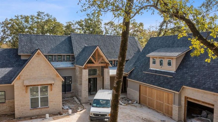 Incredible custom waterfront home currently under construction in Pinnacle Golf Club, Cedar Creek Lake. On almost 1.5 waterfront acres, this amazing home has 12 foot high ceilings, abundance of entertaining space inside and out, exceptional water depth and protection. Estimated completion first quarter 2023. 4,477 sqft. of living space, 7,148 sqft. under roof. 4 bedroom plus loft area above game room, exercise room above garage, 5.5 bath, and enormous 3 car garage. This home has everything: built in nugget Ice maker, 48” professional Thermador gas range, dual kitchen dishwashers, water filtration system, 36kw full house Generac generator, new boathouse... and the list goes on!