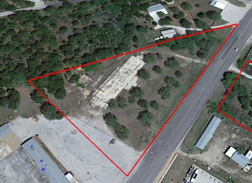 Property is rectangular (2.00 acres) with approximately two hundred twenty (220) feet of Highway 206 aka Old Highway 80 frontage. There are lots of beautiful live oak trees. It is located next to the Lone Star Inn motel and includes some pavement for parking and is also across the road (Highway 206) from the Stripes Sunoco Convenience Store. The survey is included in the photos. The best use would be a strip mall, fast food restaurant, such as Whataburger, Burger King, or Taco Bell, professional offices, or medical offices. Drone video is available, upon request. It could be long-term triple-net ground leased or would consider a build-to-suit offer. Will subdivide the property for sale or long-term net ground lease. (See survey.)