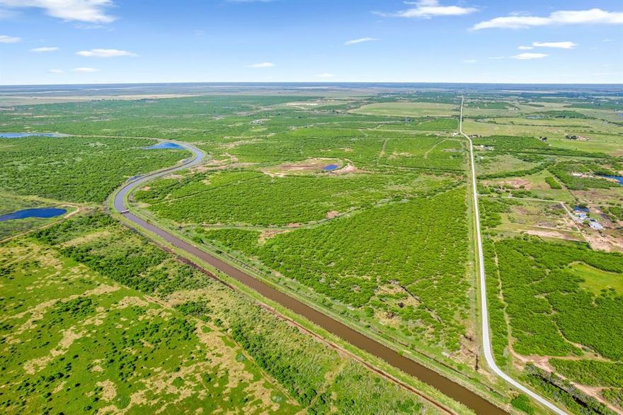 2858 acres situated about 20 miles W of Wichita Falls. Property sits on edge of Wichita and Archer counties. 2 main entrances. Numerous ponds. Approx. 6 miles of irrigation canal crosses property. 2400 sq ft house with carport (needs some work). Large steel hay barn. 2 sets of pens. 2-20x60 barns. Deer creek crosses land. Full fenced & cross fenced. Multiple projected uses including ranch, farm, hunting, recreation. See survey. Sellers' portion of minerals are negotiable.