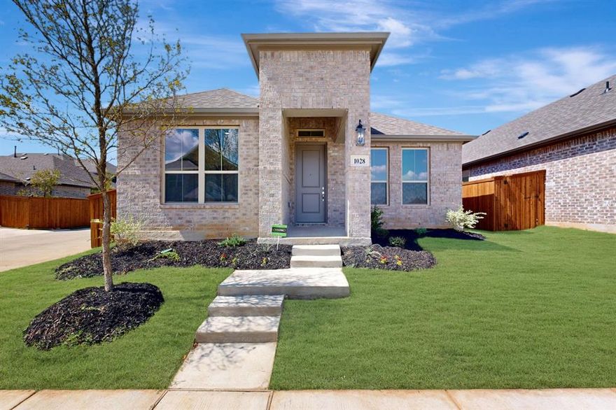 Built by M-I Homes. Discover this beautiful new construction home at 1028 Western Hills Drive in Crowley, built by M-I Homes. This  home offers thoughtful design and quality craftsmanship throughout its one-story layout.
 
Features:
3 bedrooms including an owners bedroom suite with an attached bath, dual-sink vanity, and walk-in closet
2 full bathrooms
Open-concept living space with sloped ceilings—perfect for entertaining
Quality finishes throughout
Patio
Rear-load garage

This single-story home provides the ideal balance of comfort and functionality. The well-designed floorplan maximizes living space while maintaining privacy where needed. 
 
The heart of this home is the open-concept living area, where the kitchen flows seamlessly into the dining and living spaces, creating a wonderful environment for both everyday living and special gatherings. Natural light fills the interior spaces, highlighting the careful attention to detail throughout.
 
Built with industry leading quality standards by M-I Homes, this new construction home offers the peace of mind that comes with contemporary building practices and materials. Each room has been thoughtfully designed with both aesthetics and practicality in mind.
 
The Tarrytown community provides a welcoming atmosphere with proximity to parks and recreational opportunities. Plus, enjoy the benefits of new construction without the long wait, as this home is a Quick Move-In and waiting for its first owner.
 
Experience the quality design and craftsmanship of this beautiful Crowley home—contact our team to learn more about it or to set up your in-person appointment!