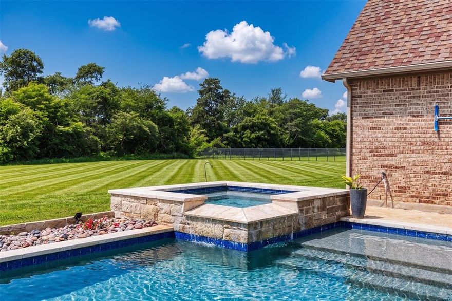 Welcome to this stunning custom-built home perfectly situated on 2.5 acres at the end of a quiet cul-de-sac, offering both privacy and space to enjoy. This thoughtfully designed 4-bedroom, 3.5-bath residence blends timeless style with modern comfort.
The home showcases beautiful stone and board-and-batten exterior details, complemented by neutral tones throughout the interior. Inside, you’ll find new carpet in all bedrooms, quartz countertops, stainless steel appliances, custom fixtures, and solid wood cabinetry that elevate both form and function.
Designed for flexibility and entertaining, the layout includes a dedicated home office and an expansive upstairs retreat featuring a bonus room, full bath, and media room—perfect for guests, hobbies, or movie nights.
Step outside to your own private oasis with a diving pool, relaxing spa, and fenced yard, ideal for gatherings or peaceful evenings at home. A rare golf cart garage adds convenience and extra storage.
Located in a highly desirable community known for its state champion football program, this home is also zoned to a new state-of-the-art elementary school, with a brand-new high school coming soon—making it an excellent choice for future growth and value.
This one-of-a-kind property offers the perfect balance of luxury, comfort, and location—don’t miss the opportunity to make it yours.