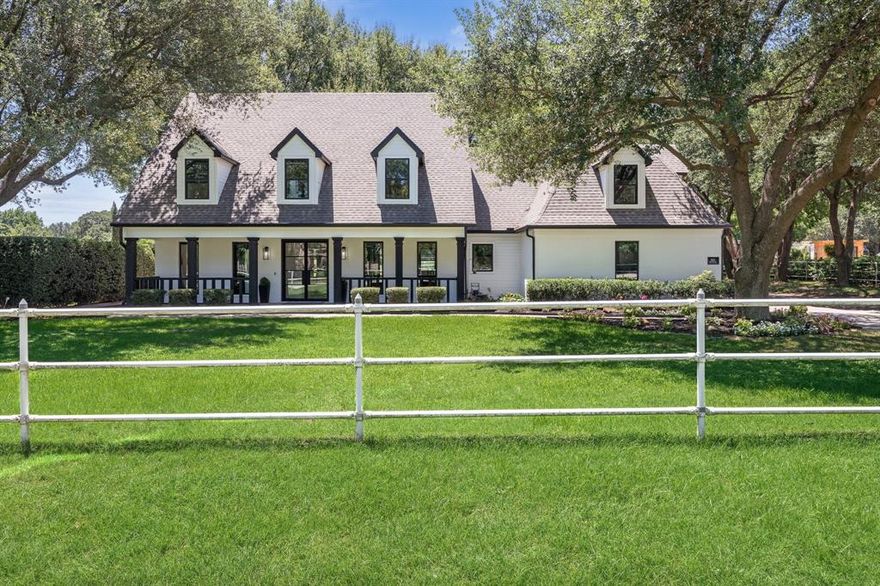 Experience the perfect balance where modern sophistication meets classic Texas charm at this beautifully reimagined property in the heart of Colleyville. Set on lush acreage shaded by mature trees, this exceptional property combines a fully renovated modern farmhouse with equestrian-friendly amenities—creating a rare offering in one of DFW’s most coveted communities.

Step inside to discover an open, airy floor plan where natural light pours through expansive windows, framing serene views of the grounds. The chef’s kitchen is the centerpiece of the home, featuring custom cabinetry, premium appliances, and a striking island that seamlessly connects to the living and dining areas. The living room is anchored by a sleek fireplace and flanked by built-in shelving, making it as stylish as it is inviting.

The first-floor primary suite offers a private retreat, complete with a spa-inspired bath featuring a soaking tub, dual vanities, and dramatic black-and-white marble. Upstairs, you’ll find three additional bedrooms, a spacious family room with a bar, and flexible space for relaxation or play.

Work-from-home days are elevated by the dedicated office, while wide-plank hardwood floors throughout bring warmth and continuity to every room.

Outside, the property opens up to an expansive patio perfect for entertaining, a fenced pasture, and a well-maintained barn with stalls, ideal for horses or hobby livestock. The land offers endless possibilities—whether you dream of gardening, riding, or simply enjoying the peaceful setting beneath the shade of mature oaks.

Located just minutes from top-rated Colleyville schools, shopping, and dining, yet offering the privacy and space of true country living, 511 Shelton Drive is more than a home—it’s a lifestyle.