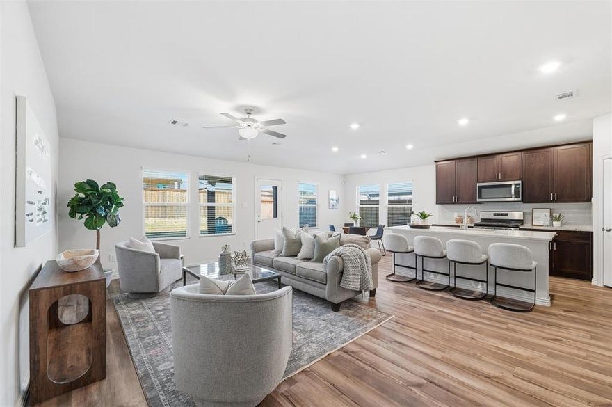 Welcome to 10424 Colina Drive, a beautifully maintained, move-in ready one-story home located in the sought-after Ventana community of Fort Worth, offering 4 spacious bedrooms, 3 full bathrooms, and 2,239 square feet of thoughtfully designed living space. Built in 2021, this home features an open-concept layout that seamlessly connects the living, dining, and kitchen areas, making it ideal for both everyday living and entertaining. Enjoy granite countertops, stainless steel appliances, and a classic subway tile backsplash that create a clean, timeless aesthetic while offering ample workspace. One of the guest bedrooms includes a private ensuite bathroom, perfect for hosting guests, accommodating extended family, or creating a private home office suite. The primary retreat offers comfort and privacy, while the additional bedrooms are generously sized. Step outside to the backyard, where a charming pergola creates an inviting space for relaxing evenings, outdoor dining, or weekend gatherings. Conveniently located just minutes from downtown Fort Worth, this home allows you to ditch the long commute and enjoy more time at home or exploring nearby shopping, dining, and entertainment options. Residents of Ventana also enjoy access to resort-style amenities, including a sparkling community pool, dog park, and family-friendly spaces, making this home an exceptional blend of comfort, convenience, and community living.