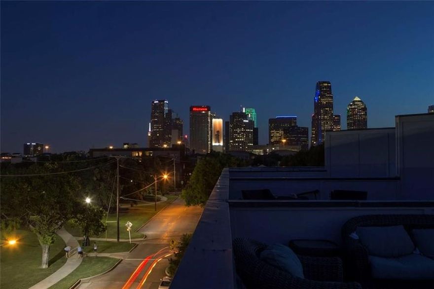 Location, Location, Location!!! Stunning Single Family Townhouse with a Rooftop patio, facing Exall Park, close to Baylor Medical, Arts District and Downtown. Entertain from your rooftop deck with downtown, Uptown, and park views! Roof top has high end Trex decking and a BBQ grill. Perfect floor plan with tons of natural light and an open concept kitchen, living, dining area. Luxurious finishes throughout the property include stainless steel appliances, plantation shutters, marble, spa-like master bathroom, hand scrapped walls, a large master bedroom with park views, sky lights, wet bar, and a built-in wine cooler.  Available to lease for $3595 per month.