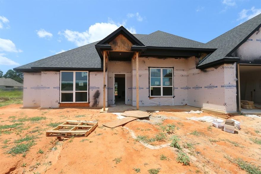 ***HALF-ACRE LOT IN S. TYLER*** This new construction home on a half-acre lot is located in a serene country setting minutes from everything that South Tyler has to offer! COOPER ESTATES UNIT 2 is a planned development that consists of HALF ACRE OR LARGER lots. The exterior of the home is breathtaking with the 10' and 12' pitch roof and grand entrance. This home has 4 bedrooms, breakfast nook, HUGE gourmet kitchen, 2 bathrooms, and 2 car side-entry garage. Featuring solid countertops, custom cabinets, gas cooktop, wood floors (no carpet), lots of crown molding, fireplace, tile floors, shower and separate soaking tub in master bath, 13' ceilings and more. There is a covered patio to enjoy the large backyard! Welcome to YOUR new Home!!