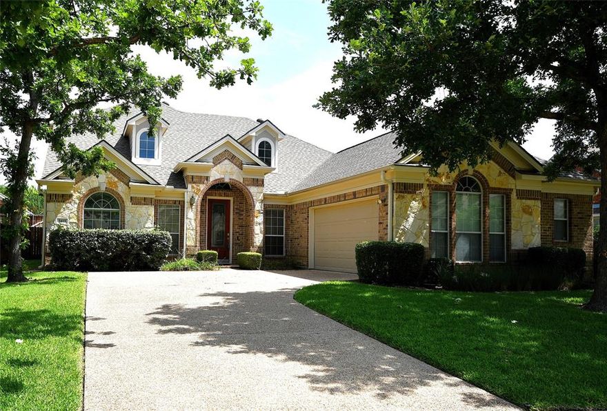 **2% FIRST YEAR 1% SECOND YEAR INTEREST RATE BUYDOWN AVAILABLE**  Build by Grand Homes in Spring Meadow Estates.  Open concept floor plan featuring several unique shaped rooms.  5 bedrooms, 3 full bathrooms, office, large gameroom with wet bar and formal dining room with butlers pantry.  Entry way features slate tile with an open dining room to the right and a large study with french doors on the left, featuring a beautiful library wall.  Ahead is a large living room with a corner stone fireplace.  The open kitchen is off the living room, featuring a large island, granite countertops and high end stainless steel appliances.  The primary bedroom is downstairs along with three additional bedrooms.  The primary is unique shaped and features a sitting area, two walk in closets and an ensuite bath with seperate shower and gardentub. Upstairs is a game room big enough for a pool table and a game table and it has a built in wet bar.  The fifth bedroom and a full bath are also upstairs.  The backyard features a large stone patio with plenty of space grilling and outdoor furniture.  Great location with easy access to 78 and PGBT, five minutes from Firewheel. You need to see this home to appreciate all it has to offer.