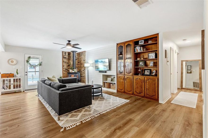 MOTIVATED SELLER!! Welcome to this charming 3-bedroom, 2-bath home nestled in a quiet, established neighborhood in Greenville. This beautifully updated residence boasts new luxury plank vinyl flooring in the main living areas and fresh carpet in the bedrooms, providing a modern and comfortable living experience.

As you step inside, you'll appreciate the blend of new and original solid wood built-ins and cabinets, which add character and warmth to the home. The updated ceilings and new paint throughout the house create a bright and inviting atmosphere, while the stylish new light fixtures enhance the overall aesthetic.

The property features a spacious workshop with additional covered parking, perfect for hobbies or extra storage. Enjoy the convenience of a detached carport, electric gate, garage, and garage door opener.

Step outside to discover mature landscaping that surrounds a stunning Gunite in-ground pool, complemented by a privacy fence that ensures your outdoor space remains an oasis.

One of the highlights of this property is its unique location...the back of the home backs up to the Audie Murphy Museum, featuring a new paved walking path providing 24 7 access for leisurely strolls and exploration.

This home is a perfect blend of comfort, style, and convenience, making it an ideal retreat for families or anyone looking to enjoy the best of Greenville living. Don’t miss your chance to make this wonderful property your own!