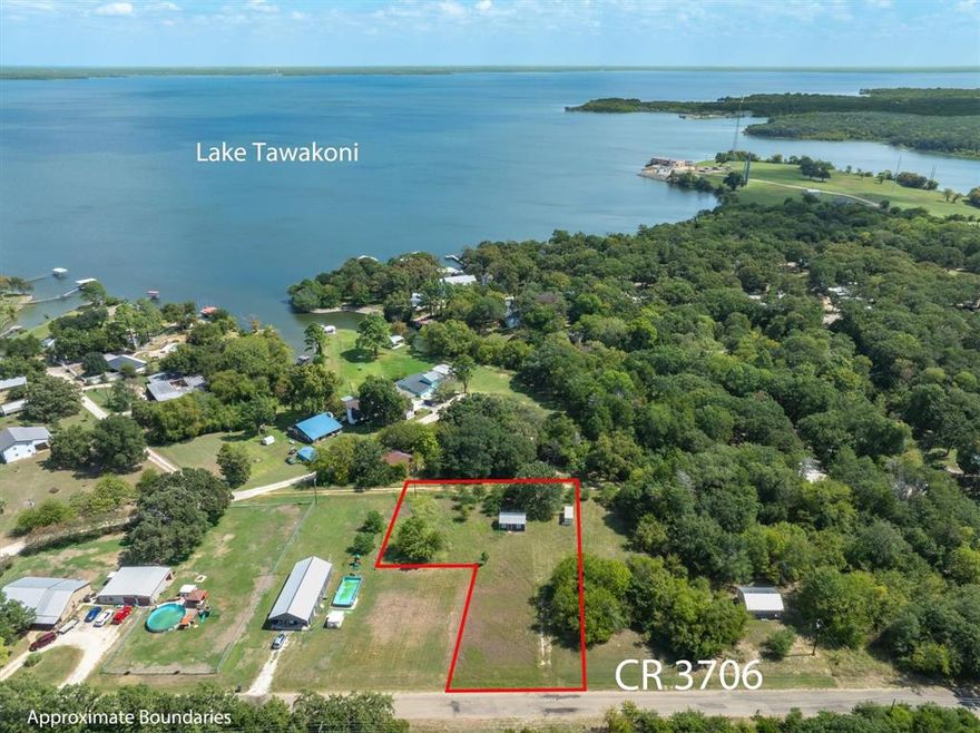 Rare Opportunity at Lake Tawakoni – Three Lots with Tiny Home!

Seize the chance to own nearly ¾ of an acre in the highly sought-after Holiday Estates subdivision—a gem within one of Lake Tawakoni’s most desirable communities. This unique property features three cleared, contiguous lots with dual access from Pump Station Road (CR3706) and Tomahawk Trail, offering endless possibilities for building and development.

Nestled on the property is a charming 16’x24’ tiny home, thoughtfully designed with upcycled wood paneling, a brand-new mini-split HVAC system to keep you comfortable year-round, sleek modern ceiling fans with drop-down lighting, and a 200-amp circuit ready to power full appliances. (Furniture negotiable!) For added convenience, there’s also a 20’ Conex storage unit—perfect for stowing fishing gear, lawn equipment, or all your favorite lake toys.

With ample space to bring your vision to life, you can design your dream lake retreat with room for a custom home, workshop, RV, boat storage, or all of the above. Use the tiny home as a cozy guest house or a weekend escape while you build.

Holiday Estates residents enjoy no HOA fees and exclusive access to their private boat ramp, just around the corner. For even more water access, a large public ramp is only minutes away. Plus, Lake Tawakoni State Park is just a short 15-minute drive. Known as the Catfish Capital of Texas, Lake Tawakoni is a fishing haven and a favorite spot for outdoor enthusiasts.

Opportunities like this don’t come around often. Undeveloped land in Holiday Estates is a rare find, and with these upgrades and possibilities, this property is truly one-of-a-kind. Don’t let this once-in-a-lifetime chance slip away!