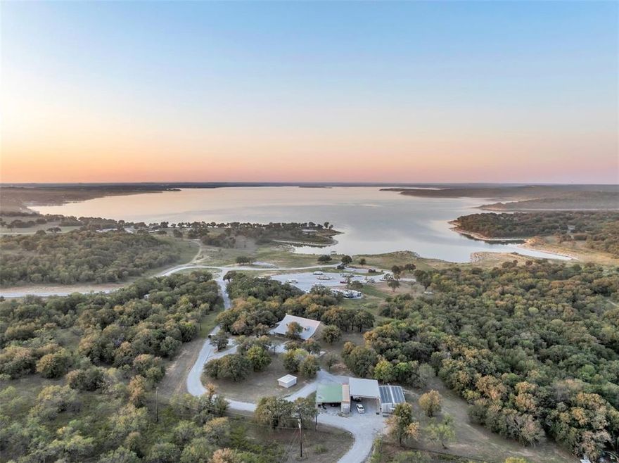 Incredibly rare opportunity to own this stunning property on Lake Bridgeport! The Stanford Ranch has been in the family for over 70 years and located in the heart of Texas! Enjoy the luxuries of both ranch and lake life with 75.5 acres and over 1500 ft. of lake frontage. The flexibility this property provides puts itself in a very unique category. A revenue generating RV park and cabins on the property makes it even more desirable. On the other hand, a pristine 3500 sq. ft. custom home sits at the highest point giving you the best views of the property and lake! This place is a turnkey paradise for it's next owner from the high end infrastructure and pristine condition from top to bottom. Enjoy the 600 ft. fishing dock, 145' cement boat launch, underground utilities, 42 full hookups with 50,30,20 amp pedestals and 5 cabins. Sewer and city water with great water pressure. All sites are leveled and all weather chipped sealed. Large gated overflow parking for boats, Rv's and additional car parking. No deed restrictions give you unbridled freedom to turn this property into a dream. Fully fenced on south, east and west sides of the property with the north side to be completed shortly. there are two 10,000 gallons of water storage, 2 jet pumps ensure consistent pressure, enclosed inside a spray foamed metal building that can support 120+ rv sites currently. The possibilities are ended at the Stanford family ranch, where you can choose to generate extra income from the RV park and cabins or build a family compound - or both!