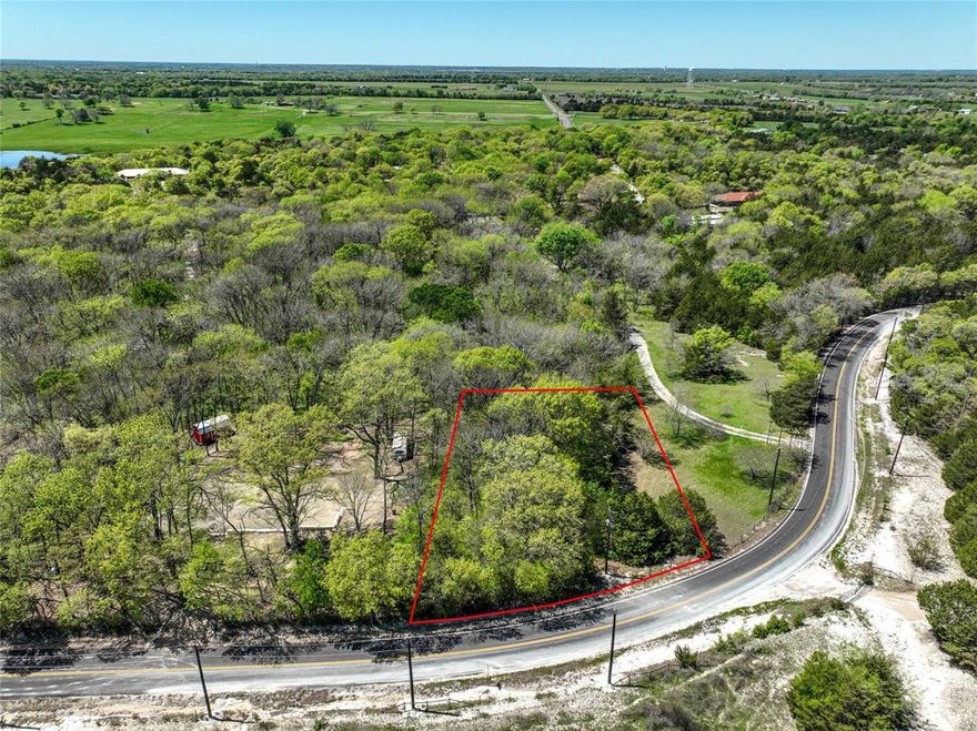 Beautiful 1 acre property part of approx a 7 acre tract.  The 1 acre has great frontage road access.  Approx 2 miles from SH 121.   Also easy access to and from Anna Melissa or Van Alstyne TX.  Minutes from Buccees and from Allen and McKinney TX. Come see this beautiful heavy wooded 1 acre off of Farm to Market Rd 3133.   See orange markings on the fence line for the approx 1 acre property lines.   Owner lives at the back of the long drive way.  Buyer to purchase SURVEY.
