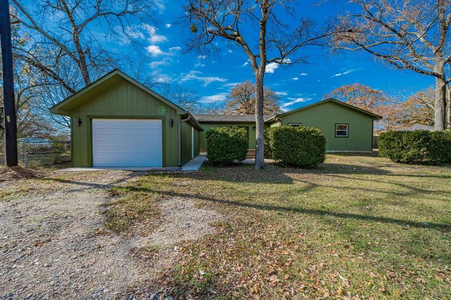 Built in 2024, this thoughtfully designed 1,320-square-foot home sits on two lots totaling approximately 0.27 acres and offers an open, inviting layout ideal for modern living. The living room serves as the heart of the home, providing a comfortable gathering space with a seamless flow into the kitchen. The chic kitchen is filled with natural light and features stainless steel appliances, stone countertops, and accent lighting that adds a polished, contemporary feel. The private primary suite offers a relaxing retreat with an ensuite bath designed for everyday comfort. Additional bedrooms provide flexible space for guests, hobbies, or a home office, while a dedicated laundry room adds everyday convenience. The 15’x24’ garage is fully powered with GFI-protected outlets on every wall, a garage door opener, motion-sensor downlighting, decorative wall sconces at the entry, and a side access door. Outside, the spacious yard offers room to enjoy the peaceful surroundings. Located minutes from Cedar Creek Lake and about an hour from Dallas, Kemp is known for its laid-back lifestyle, access to boating and bass fishing, and easy connectivity to nearby cities. Claim Your Piece of Texas!
