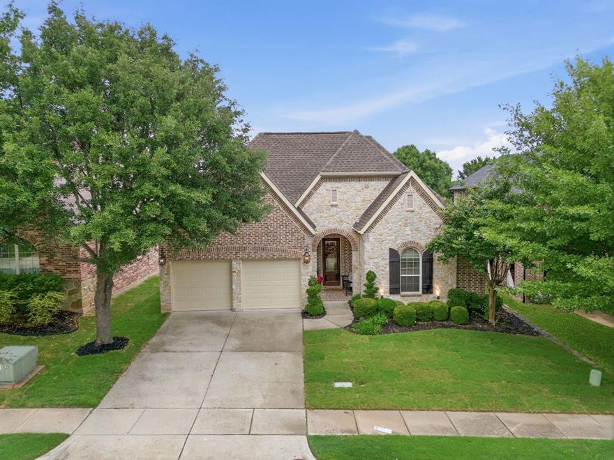 Welcome to 7712 Harvest Hill Lane in the heart of McKinney! This beautifully maintained 4-bedroom, 2-bath home offers an unbeatable location near Hwy 75 and 121, with easy access to shopping, dining, and the charm of Adriatica Village. The home features stunning curb appeal with a stone front elevation, upgraded decorative front door, and refreshed landscaping. Inside, enjoy a fully remodeled interior with hardwood floors throughout, plantation shutters, crown molding, and upgraded lighting. The kitchen and both bathrooms have been thoughtfully renovated with modern finishes. Step outside to an extended patio with travertine pavers—perfect for entertaining. Located in a vibrant community with pools, clubhouse, playgrounds, tennis and pickleball courts, trails, and lakes—this home truly has it all!
