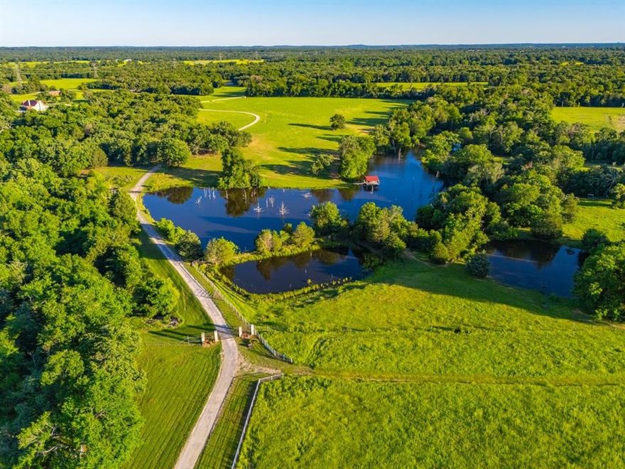 This is the greatest all-around ranch that I have ever stepped foot on. The location being 3 miles from Fairfield makes this less than a 4-hour drive from every major city in Texas. 373 acres of a turnkey high fence ranch stocked with 2 houses, 2 large professional fishing lakes with boats and boat houses, 12 additional ponds and lakes with a total water surface of over 20 acres, a herd of elk, an improved herd of white-tailed deer, axis deer and gorgeous zorses. Rolling hills lined with ponds and lakes everywhere, with a mixture of pasture and oak tree forests and a creek to top it off. High fenced, cross fenced, multiple sets of working pens and hay fields. Over half a mile of paved driveway that crosses a lake and winds through oak trees as picturesque as anywhere. American flag in the yard.

Hunting, Fishing, Cattle, Equestrian, Barns, Lakes, Houses, Pool, Elevation, Peaceful Retreat. You want it, this place already has it. Genuinely an incredible place on this earth.