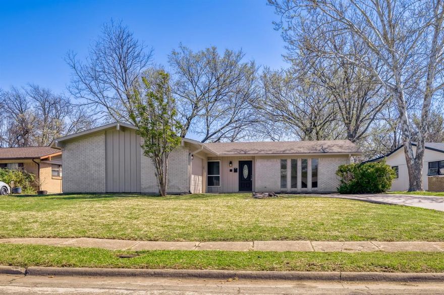 Remodeled home located in the highly sought-after Midway Hollow neighborhood. This property features an attractive open floor plan in the living area, complemented by wood and tile flooring and a fresh coat of paint throughout the entire house. The master bedroom includes a modern stand-up shower, and the living space is anchored by a classic brick fireplace. Additional amenities include an electric garage with a remote opener for your convenience. The exterior of the home offers a large, quiet backyard secured by a wood fence, along with an extra patio space perfect for outdoor activities.