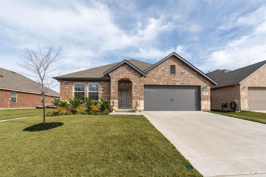 Wide entry hallway with space for furniture & décor, accented by Hudson Valley light fixtures. Light oak 
vinyl plank flooring flows throughout the main living areas, creating a bright & cohesive feel. Bedrooms 2 & 
3 are located off the entry & feature carpet & walk in closets, with a guest bathroom between them 
offering a tub & shower combination, tile surround, quartz countertops, tile flooring, & built in storage. 
Bedroom 4 is positioned across the hall & works well as a home office or flex space. Separate laundry 
room includes tile flooring, shelving, & extra storage. Open concept living area offers generous space for 
seating & entertaining, with windows overlooking the backyard & greenbelt. Eat in kitchen features 
recessed lighting, a large island with seating, granite countertops, stainless appliances, gas range, walk in 
pantry, & neutral painted cabinetry in SW Shiitake. A Visual Comfort chandelier anchors the living space. 
Patio door with inset blinds & a full view storm door with pet access opens to an oversized covered patio. 
Spacious primary suite overlooks the greenbelt & includes an en suite bath with dual quartz vanities, tiled 
shower with rainfall shower head, built in seating, shampoo niches, separate water closet, & added storage 
shelving. Large walk-in closet accessed from the bathroom. Backyard backs to a greenbelt with no 
neighbors behind, wrought iron fencing at the rear, wood fencing on the sides, & a brick paver grilling area. 
Located four houses from a park with easy access to walking trails & walkable to elementary & middle 
schools. Thoughtful design, plantation shutters, functional layout, & peaceful views make this home a 
standout. FULL FEATURES LIST AVAILABLE.