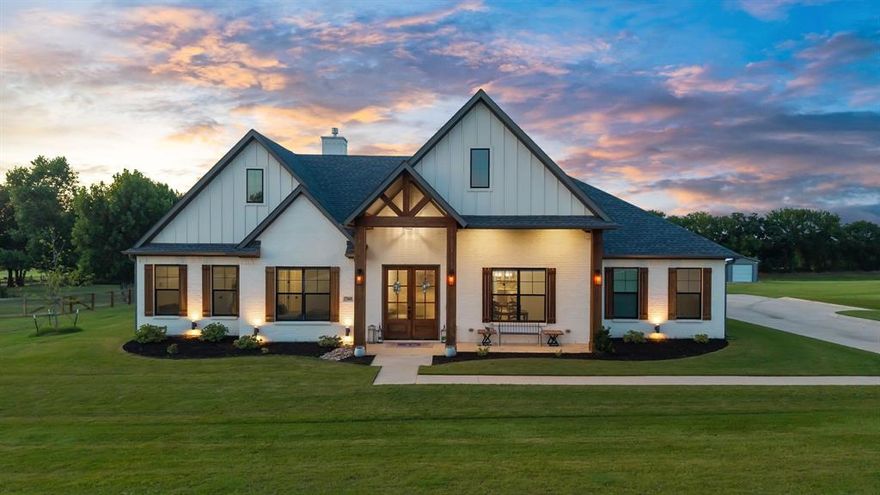 BACK ON MARKET at no fault to the sellers! Buyers got cold feet and never had an inspection done. Sellers are very motivated & ready to get a deal done.

Welcome to 7360 Shady Oak Drive, located in the highly sought-after Aubrey ISD. From the moment you arrive, the beautiful modern farmhouse style and inviting curb appeal will capture your heart. This thoughtfully designed home offers 4 spacious bedrooms and 3.5 bathrooms, blending luxury and comfort in every detail.

Inside, the open-concept living space features striking wood-beamed ceilings and a gorgeous fireplace, creating a warm and welcoming focal point. The light-filled dining area flows seamlessly into the chef’s kitchen, complete with two islands, stunning flooring, and designer fixtures. The spa-like primary suite is a serene retreat, offering the perfect place to relax after a long day.

Set on over an acre with mature trees, the property is built for both beauty and function. Two-thirds of the lot is fully irrigated with a 17-zone system to keep the landscape lush and vibrant. The backyard is a true outdoor paradise, with 500 square feet of covered patio living space, an outdoor fireplace, and a low-maintenance turf lawn perfect for year-round enjoyment. The massive 7,700-square-foot driveway leads to an attached two-car garage as well as a detached garage, providing ample parking and storage.

Every inch of this home showcases thoughtful design and high-end finishes, creating a luxurious lifestyle both indoors and out. Whether you’re entertaining on the expansive patio or unwinding in your private retreat, 7360 Shady Oak Drive is the perfect place to call home.