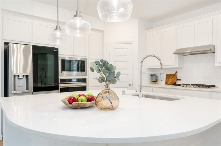 Easy access to all local schools with no highways or train tracks to cross! Still giving new vibes, completed in 2022 by prestigious Highland Homes offers style, comfort and convenience. With a timeless brick façade exterior on a low-maintenance 40-foot lot with rear-entry garage that keeps the streetscape clean and tidy, this one checks all the boxes. Inside, inviting LVP flooring flows through the main level, complemented by abundant natural light streaming through multiple oversized windows. The open kitchen is a blank slate and shines with quartz countertops, a fun geometric backsplash, a single basin sink and rounded island perfect for casual dining or hosting friends. The primary suite is conveniently located downstairs, while the upstairs loft provides flexible space alongside two secondary bedrooms. Oversized downstairs laundry room and multiple closets offer an abundance of storage space. The community features pack a punch with community park just a short walk and community pool for summer fun. Be home for the holidays, move-in ready! Northwest ISD, growing corridor recently welcomed Lowes, Chick Fil-A and Texas Roadhouse