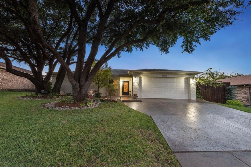 This impeccably remodeled cottage is A MUST SEE GEM!! Offering finishes that rival properties priced significantly higher, this home is a rare find. From the moment you step onto the Travertine front porch& through the welcoming entry, you'll be captivated by the attention to detail. The vaulted living room is an elegant focal point of the home, featuring a stunning stacked marble fireplace. The ceramic tile floors, both stylish & easy to maintain, seamlessly connect the living spaces, creating an inviting atmosphere for you & your guests. Step outside, you'll find a backyard that's nothing short of a tranquil retreat! The landscaping is a work of art having outdoor lighting & a relaxing fountain, turning the space into a virtual wonderland, allowing you to escape from the hustle and bustle of everyday life.The two bathrooms have also received a lavish update, the guest bathroom boasts elegant marble accents, while the primary bathroom features sophisticated porcelain tile.