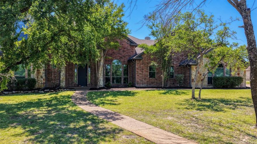 Spacious, upgraded, and built for both lifestyle and functionality, this unique property offers the perfect blend of indoor comfort and exceptional outdoor living. Inside, you’ll find generous living spaces designed for everyday living and entertaining, while the true highlights are outside.

Enjoy your own private retreat featuring a fully equipped outdoor kitchen ideal for hosting year-round. The property is set up for equestrian or hobby farm use with a custom 2-stall horse barn and approximately half an acre of pipe-fenced pasture.

The barn features oversized foaling stalls with custom doors and windows, premium Stall Saver flooring, and plumbing for automatic waterers. It’s prepped for foam insulation, with feed and tack rooms roughed in for HVAC. Additional amenities include a wash rack, multiple water access points, and wide gates for easy equipment and livestock access.

The 36’ x 65’ shop (36’ x 85’ overall with barn) offers incredible versatility with space for a gym or workspace, plus a heavily reinforced safe room with custom safe door and HVAC rough-in. The mezzanine level includes a full bath, wet bar rough-in, and is prepped for HVAC ideal for office or entertainment space.

Built for durability, the shop includes a reinforced slab, added structural supports, separate electrical panel tied to the home and Generac generator, gas lines, lift station, and high-speed internet.

Major 2022 upgrades include Low-E windows, two TRANE HVAC systems with WiFi thermostats, fully encapsulated foam attic, added fresh air vents, WiFi garage doors for home-shop-barn, and a new 30-year composition roof. A Generac whole-home generator provides added peace of mind.

This property offers a rare combination of modern upgrades, land flexibility, and outdoor living—perfect for those looking to live, work, and play in one place.
