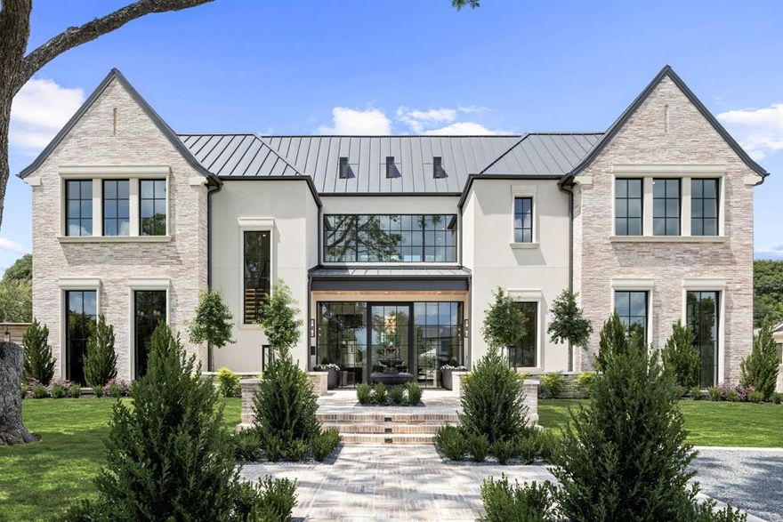 BACK ON MARKET!!!  BUYERS COULD NOT OBTAIN FINANCING!!! Luxury at its Best!!! Transitional Traditional New Construction Home built in 2025.  Stunning Architecture from Juan Carlos Deleon. Beautiful mid century exterior brick throughout entire home, with an abundance of cast stone features. Floor to ceiling windows that bring a ton of natural light in the foyer, marble black and white checker flooring, historic old wood beams covering the ceiling. 6 bedroom, 7.5 bathrooms, Study, Game Room, Media room, Bar Lounge area off the wet bar and living rooms. Formal Dining with Prep Kitchen attached and as well as to the main Kitchen.  Prep kitchen with full ovens, dishwasher, refrig, and walk in Pantry. 7700 Total Square footage. 3 car tandem garage, accessing the front of the house  with gated motor court and accessing the back alley with electric gate.  Primary Suite on the main floor, heated bathroom floors, oversized shower, large bathtub, Luxury designed LED lit cabinetry throughout, 10 foot slider doors accessing pool hot tub and cabana. Guest suite located on the main level as well and 4 more bedrooms upstairs. Outdoor living at its best, with covered patio with roll down screens, fireplace, ceiling mounted heaters, and another fire-pit at the cabana.  Generator to operate the home if needed.