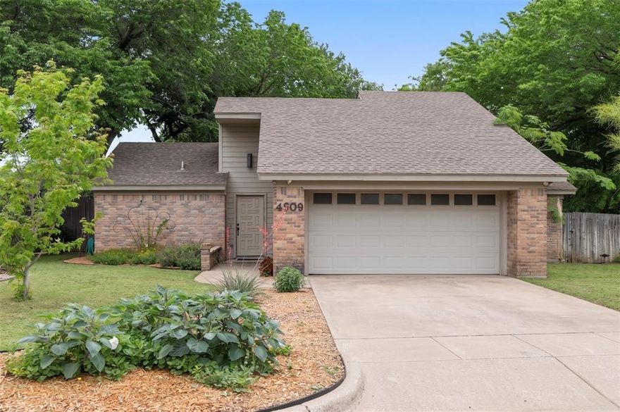 Welcome home to this charming 2-bedroom, 2-bathroom retreat nestled on a quiet cul-de-sac in one of Fort Worth's most established neighborhoods. The split-bedroom floor plan offers privacy and functionality, with each bedroom featuring its own attached full bathroom!
The warm and inviting living area is anchored by a wood-burning fireplace elegantly accented with gray tile and surrounded by built-ins. The quaint kitchen features abundant cabinetry, a breakfast bar, plant ledges, and ceramic tile countertops with a coordinating backsplash. 
Out back, enjoy an oversized partially covered wooden deck perfect for relaxing or entertaining under the Texas sky.
Located just minutes from the highly regarded Meadowbrook Golf Course, nearby Oakland Lake Park with its walking trail, playgrounds, and skate park, and with easy access to I-30 and Downtown Fort Worth. This established neighborhood offers mature trees, character, and community. Don't miss this one!
Ask about the exclusive 3% back grant this home qualifies for — a rare opportunity to make your move even smarter.