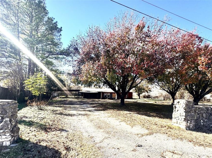 *Motivated seller, bring offers.* Large treed lot at .70 of an acre with this three bedroom, two bathroom home in Eastwood Village on the west side of Granbury. Features include a covered front porch overlooking the tree shaded front lawn, carport and additional parking opportunities for RV and boat on the lot, large covered patio with owners suite patio door access and screened in area with hot tub to enjoy, dog run and kennel set area set up, small workshop area with electric. Living area with wood burning stove and great natural lighting. Island kitchen with abundant cabinetry. Primary bedroom is over sized and includes patio door access. Attached bathroom includes dual vanities, walk in shower with bench seating and large walk in closet. Floorplan and lot offer plentiful opportunity for new owner. View today!