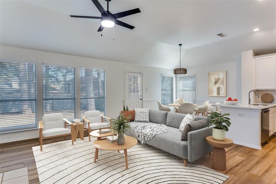 Nestled in an established Fort Worth neighborhood where homes rarely come available, this beautifully updated and move-in-ready home sits just north of I-30 and minutes from Arlington, with easy access to downtown dining, cultural events, and entertainment, including Globe Life Field and AT&T Stadium. Inside, extensive laminate wood floors, arched walkways, rounded corners, and fresh paint create a warm, inviting atmosphere. The family room has a cozy wood burning fireplace and a wall of windows overlooking the fenced backyard. The updated kitchen features quartz countertops, white cabinetry, stainless steel appliances, an electric range with induction cooktop, and a stylish backsplash. The primary retreat has dual sinks, quartz countertops, a separate shower, and a walk-in closet. Two spacious secondary bedrooms share an updated bathroom. The large backyard includes mature shade trees and a storage shed. The home is down the street from Lowery Road Elementary and close to Cobblestone Trail Park, which has 48 acres of trails, a baseball field, a playground, and picnic areas. Updates include a 2024 roof, 2019 HVAC, and 2026 kitchen appliances, flooring, lighting, paint, countertops, faucets, backsplash, and ceiling fans.