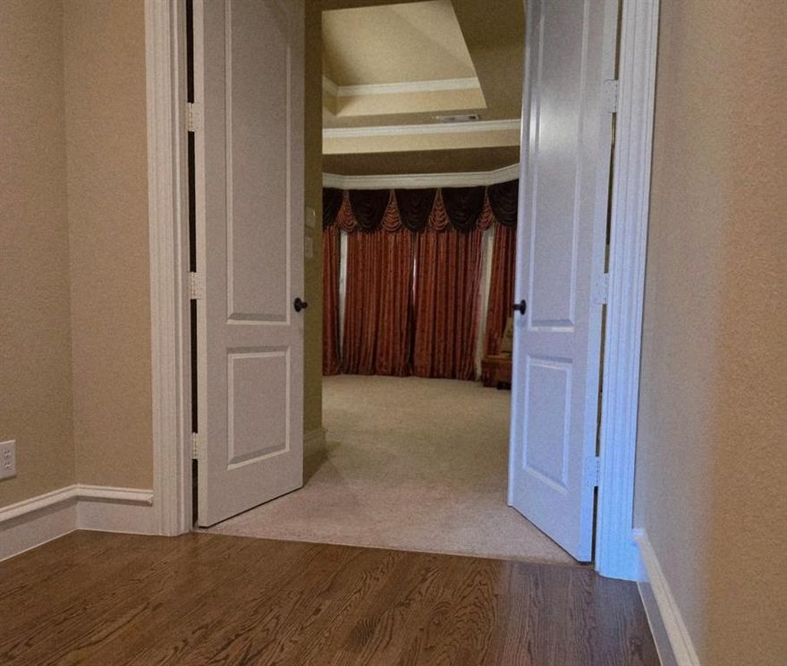 Stunning one-story home with a four-car garage, game room, and extended media room.