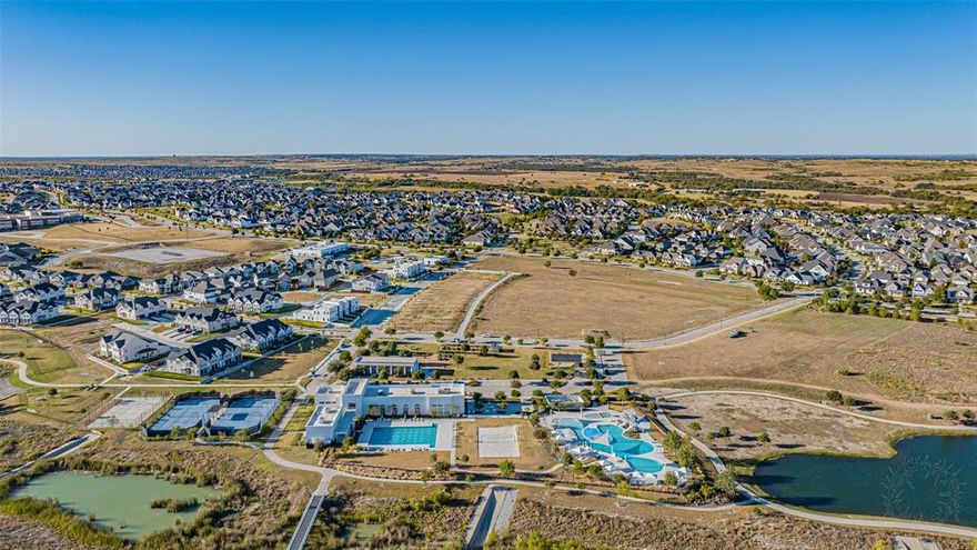 Enjoy resort-style living in this premier master-planned community, with HOA amenities including tennis courts, dog parks, a state-of-the-art multi-use gym designed for dynamic free-movement workouts, a kids' pool, adult lap pool, an updated neighborhood market with healthy snacks and local treats, and a fully equipped makerspace for building and creating with expert-grade tools. This nearly brand-new townhome is filled with natural light, soaring ceilings, and elegant finishes throughout, including 8-foot doors, 6-inch baseboards, and plantation shutters. The chef-inspired kitchen features top-of-the-line appliances, quartz countertops, gas cooktop, oversized island, built-in wall oven and microwave, and a walk-in pantry. A split bedroom layout offers three bedrooms and two full baths, with open-concept living and dining spaces perfect for everyday living and entertaining - all nestled in the heart of the highly sought-after Walsh Ranch community.